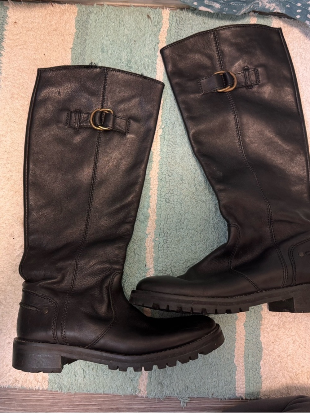 Black Leather Knee-High Riding Boots with Buckle Accent